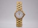 Front view of gold-tone Longines Conquest ladies' watch with white dial and integrated bracelet.