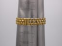 Longines Conquest watch bracelet on a wrist sizing gauge, showing a wrist circumference of 165mm.