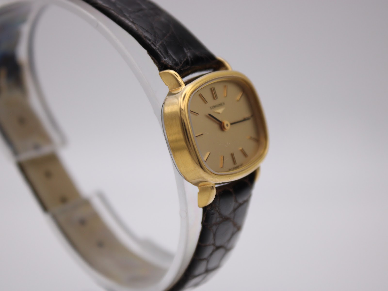 Angled front view of the Longines watch showcasing the dial and case profile.