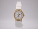 Front view of the Longines Presence ladies watch, showing the white dial and gold-tone case on a clear display stand.