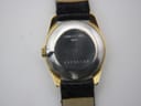 Interior view of the stainless steel case back, showing the Longines logo, 'Swiss Made', and model numbers '1132' and '817'.