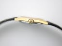Close-up of the Longines watch being measured by a digital caliper, displaying a case diameter of 23.42mm.