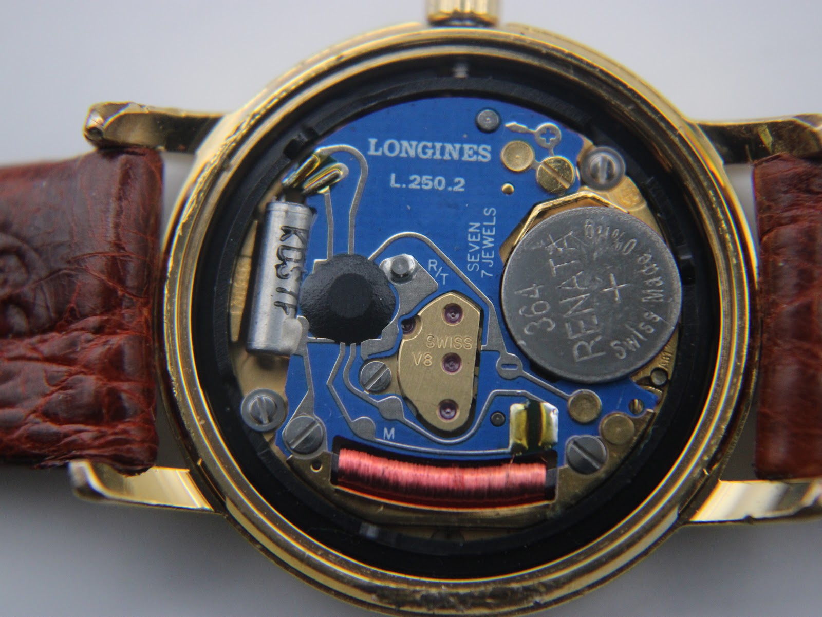 Close-up of the Longines L.250.2 Swiss quartz movement with 7 jewels and a Renata 364 battery.