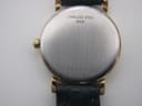 Close-up of the watch's stainless steel case back with serial number 25849420 engraved.