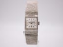 Front view of the Longines 410 ladies' watch with a textured sterling silver case and integrated bracelet.