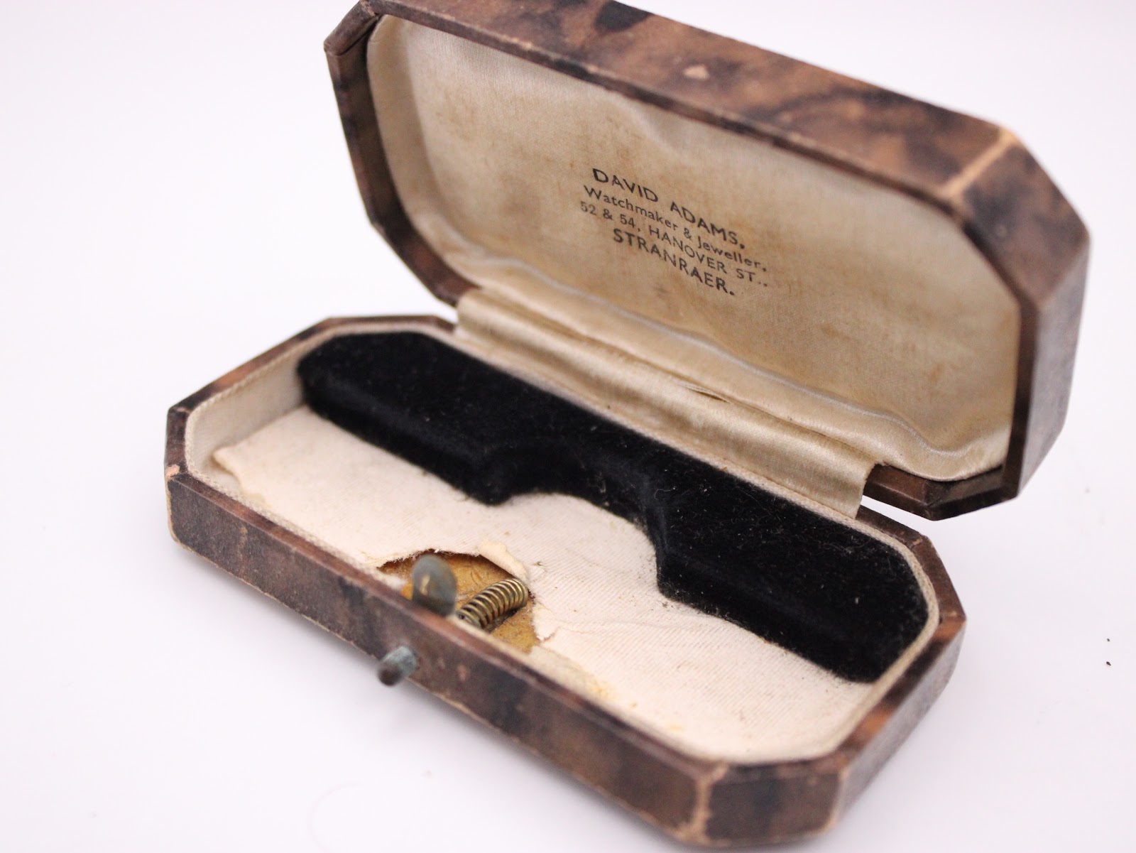 Empty antique David Adams watch box, showing the inner satin lining and jeweller's inscription.