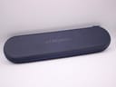 Closed blue original Longines travel case with the embossed Longines logo on its lid.