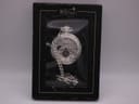 The Heritage Collection Spirit of Time pocket watch visible through the window of its closed original presentation box.