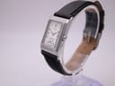 Angled side view of the Tissot Z173K watch showing the polished stainless steel case and crown.