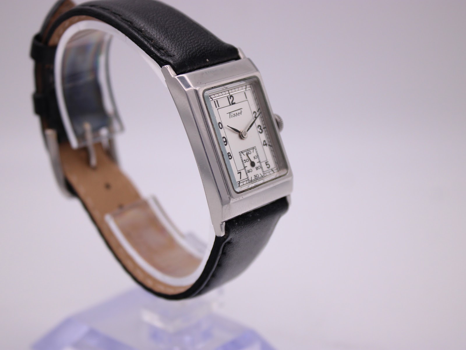 Another angled side view of the Tissot Z173K watch highlighting the case profile and leather strap.