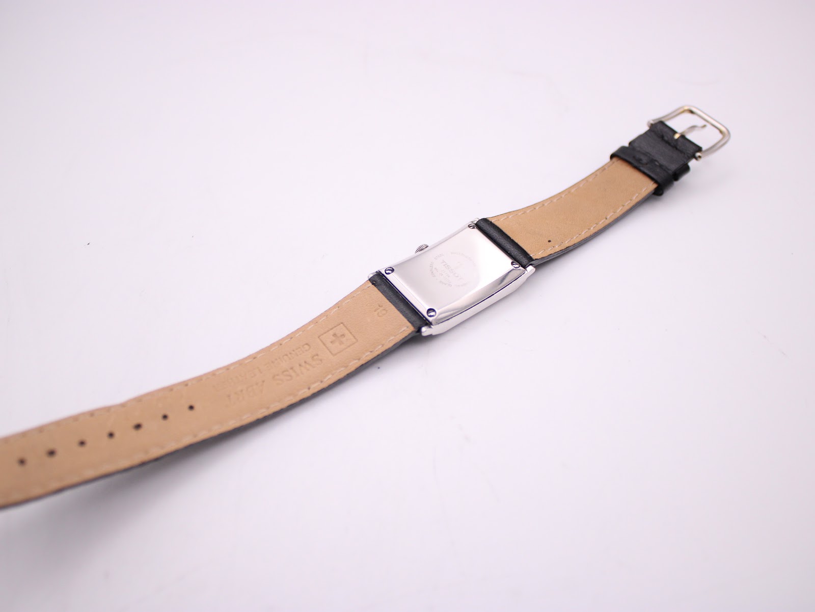 Rear view of the Tissot Z173K showing the case back and the underside of the black leather strap with 'Swiss Made' and 'Genuine Leather' markings.