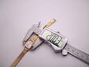 Digital caliper measuring the case diameter of the Tissot watch, displaying 20.03mm.