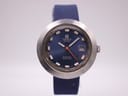 Front view of the Tissot Sideral automatic watch, showing its blue dial, silver bezel, and navy rubber strap.