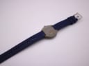 Underneath view of the Tissot Sideral, showing the textured fibreglass case back and the underside of the strap.