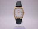 Front view of the Zenith 90/22-2280.106 watch with gold tonneau case, white dial, and green leather strap.
