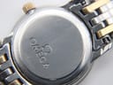 Close-up of the Omega case back with clear view of the serial number 59349106 and Omega logo.