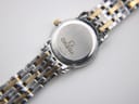 View of the Omega watch case back with serial number 59349106 and the two-tone bracelet.