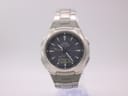 Front view of Casio Wave Ceptor WVA-430U watch with grey ana-digi dial and silver steel bracelet.