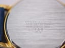 Close-up of the watch case back, detailing the 'CITIZEN WATCH CO.', 'BASE METAL', model '6031-S33930 HSW', and serial number '31158'.