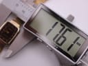 Digital caliper measuring the watch case, displaying a width of 17.6mm.