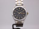 Seiko watch with black dial and silver case, 1990s