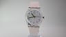 Swatch Day-Date 1990s vintage quartz watch, clear case, white iridescent dial with green numbers, light pink rubber strap