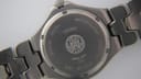 Detailed close-up of the Tissot T660 watch case back, engraved with 'WATERRESISTANT 200M', 'SAPPHIRE CRYSTAL', 'TISSOT', 'T 660', and 'TITANIUM CASE'.