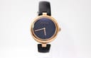 Front view of the Gucci 141.4 watch, highlighting the rose gold PVD case and black dial.