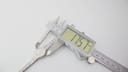Digital caliper measuring the case diameter of the Seiko 11-0630, showing a reading of 17.57mm.