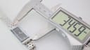 Gucci 127.5 ladies quartz watch with rectangular stainless steel case, black dial, diamond markers, and steel bracelet photo 8
