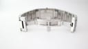 View of the butterfly clasp mechanism of the Gucci watch's integrated steel bracelet, open.