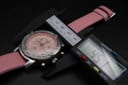 Overhead view of the Façonnable watch with a digital caliper measuring the case diameter at 45.7mm.