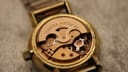 Close-up of the open case back revealing the Omega automatic calibre 684 movement.