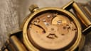 Detailed view of the Omega automatic calibre 684 movement with its engraved serial number and 'SWISS' mark.
