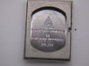 Close-up of the stainless steel case back engraving, detailing gold plating and model number 511.357.