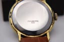 Close-up of the polished stainless steel case back of the Magna watch, with 'STAINLESS STEEL BACK' engraved in the centre.