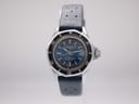 Front view of the Marine Star Tropic Star automatic diver watch with blue dial, black bezel, and dark blue rubber strap on a white background.