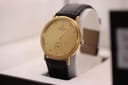 Raymond Weil Genève 9825 watch, champagne dial with small seconds subdial, front view.