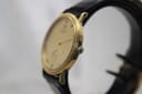 Back view of the Raymond Weil Genève 9825 case showing gold plating and case back marks.