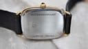 View of the brushed stainless steel case back, showing "WATERRESISTANT" and "HQ 812572" engravings.
