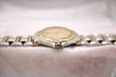 Side profile of the Gucci 8040M watch, showing the crown and case thickness.