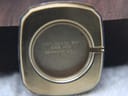 Interior of the case back showing 'STAINLESS STEEL BACK SWISS MADE RAYMOND WEIL' engraving.