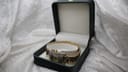 The Ingersoll Diamond watch presented inside an open dark green watch box with a cream interior.