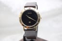 The Gucci 3000M watch displayed on a stand, direct front view, for a clear presentation.