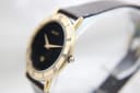 Angled side view of the Gucci 3000M watch, highlighting the case profile, crown, and bezel details.