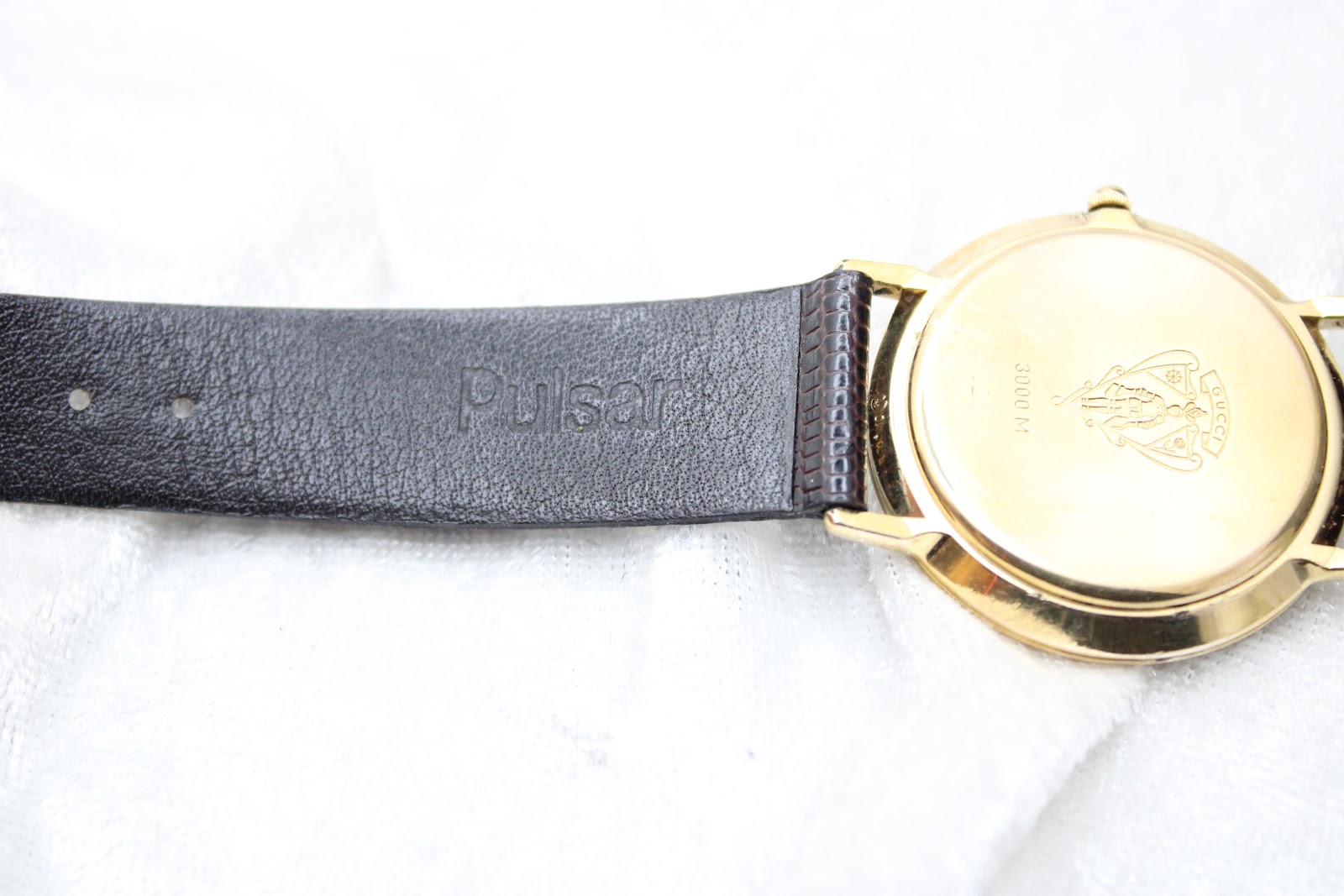 Close-up of the watch strap's interior on the other side, showing the 'Pulsar' brand embossing.