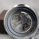 Front view of Oris Star vintage pocket watch with silver dial.
