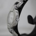 Right side view of the Tissot G330 watch, showing the polished case profile and crown.