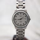 Front view of Tissot PR 50 titanium quartz watch with silver dial and date window