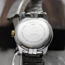 Close-up of the stainless steel case back of the Tissot PR 50, showing reference J326/426K and sapphire crystal marking.